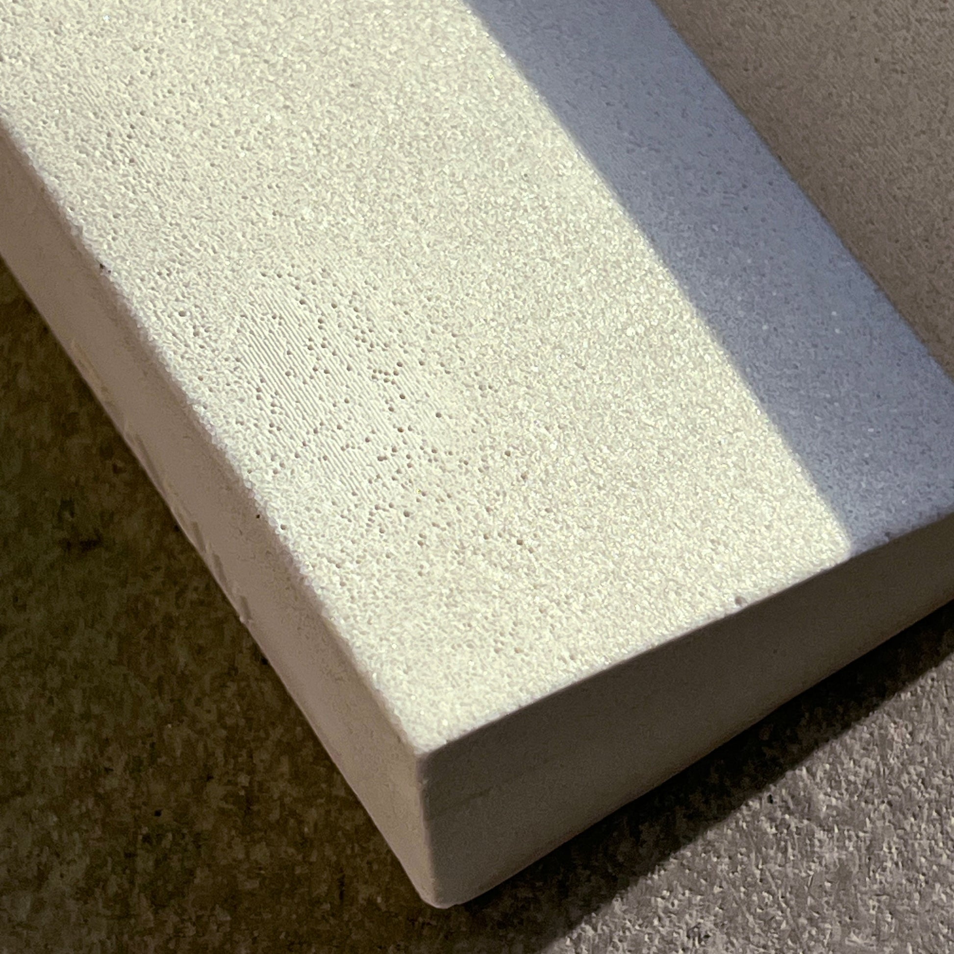 The scarp — Stone Book Holder